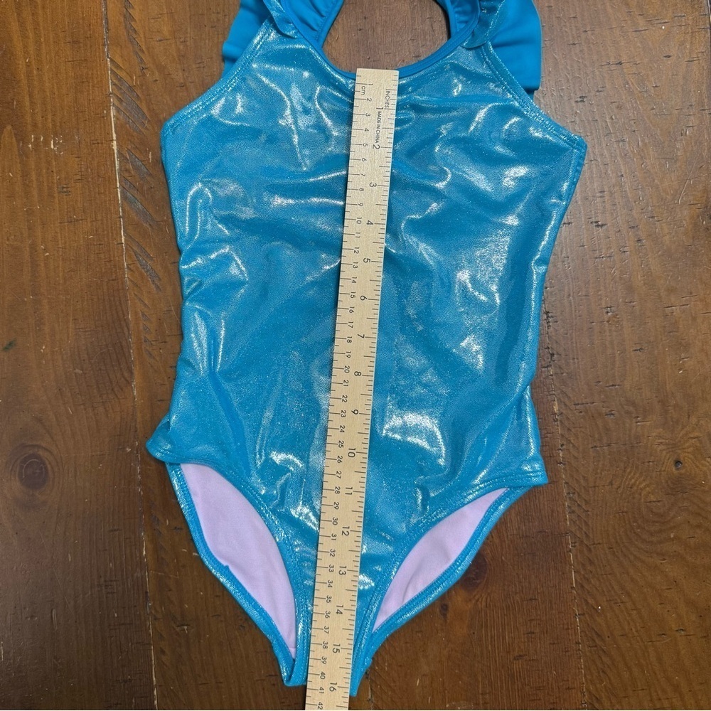 Shimmering Blue Ruffle Swimsuit - Picture 6 of 8